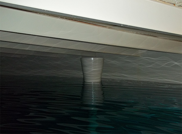 image showing full tank with water level near overflow pipe