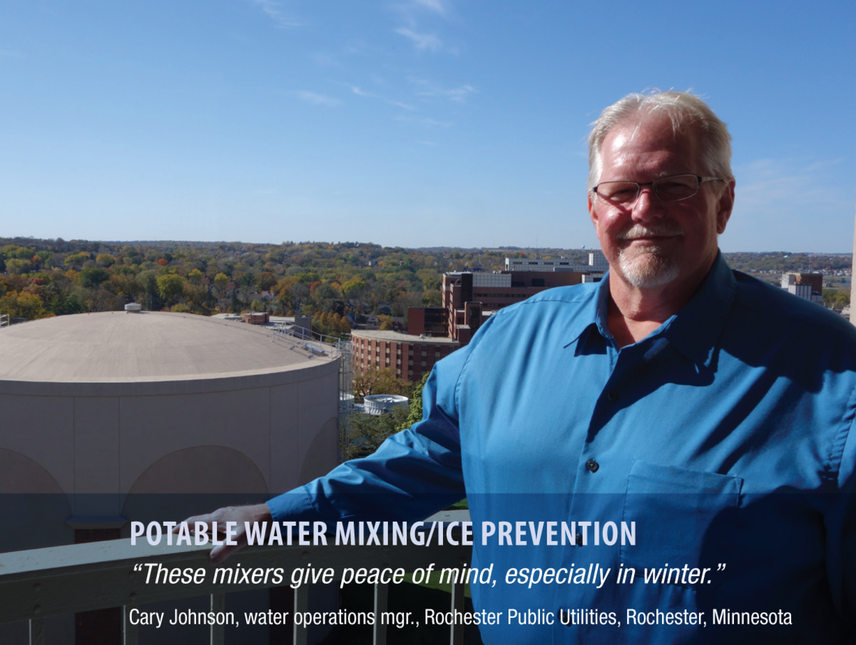 caption: potable water mixing / ice prevention quote: "these mixers give peace of mind, especially in winter"  Man on water tank with more water tanks and small town skyline in the background on a sunny day.